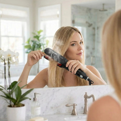 jeune blonde utilise fer a lisser vapeur