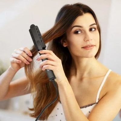 jeune fille utilise lisseur