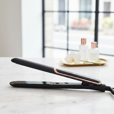 lisseur à cheveux noir